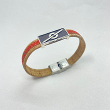 Load image into Gallery viewer, Stoke Saver Onewheel™ bracelet view from side with logo Stoke Saver visible on sterling silver bead
