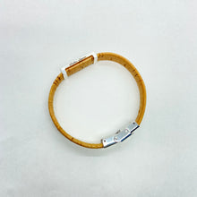 Load image into Gallery viewer, Stoke Saver Onewheel™ bracelet view from side with logo Stoke Saver visible on sterling silver bead
