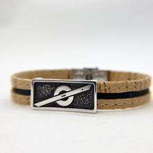 Load image into Gallery viewer, Stoke Saver Onewheel™ bracelet in rustic cork with black inlay strap and stainless steel clasp
